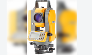 Technician inspecting surveying equipment at Caltech